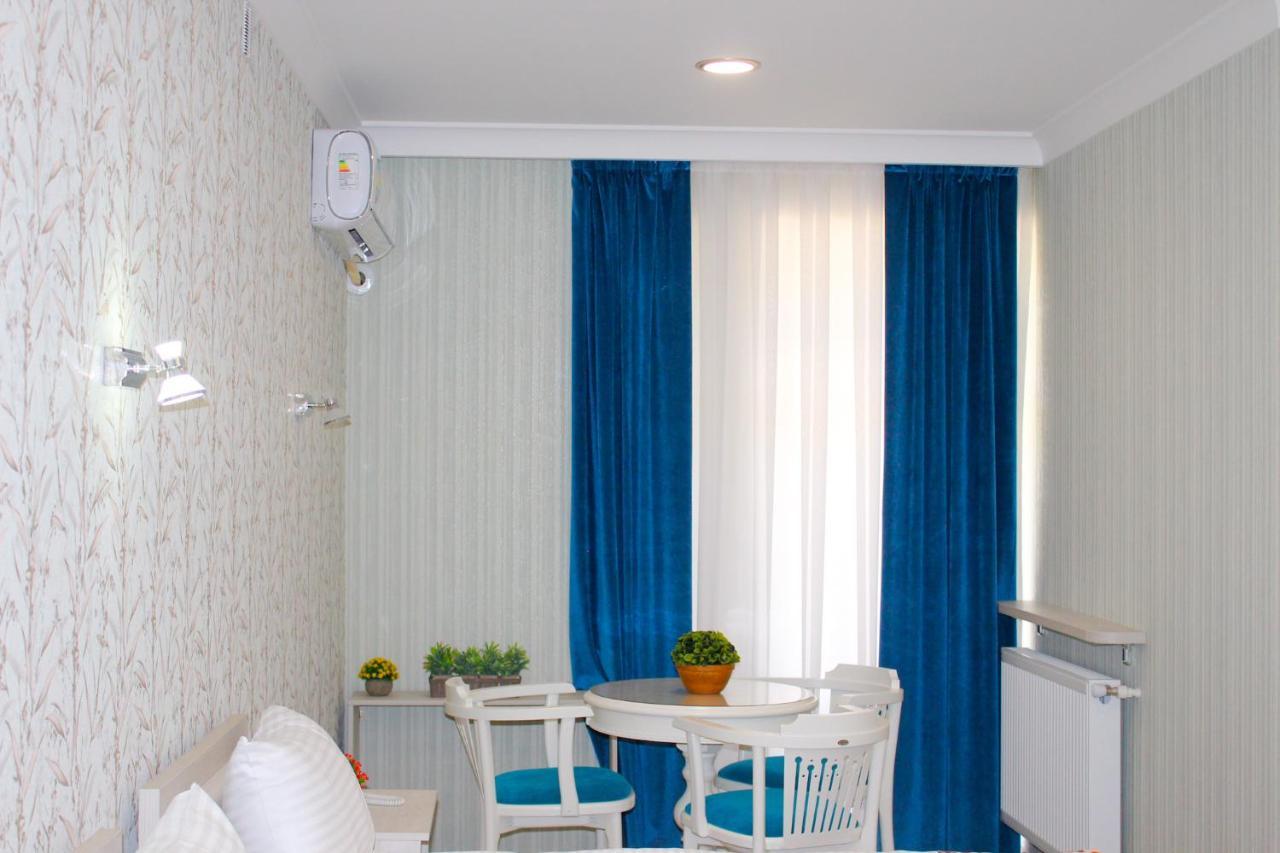 Hotel Taht Tasjkent Rom bilde